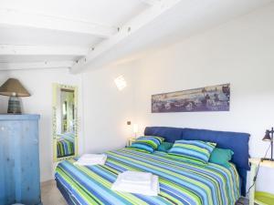 Katil atau katil-katil dalam bilik di Apartment Graziella by Interhome