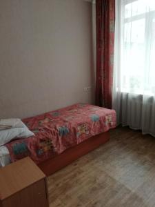 Postel nebo postele na pokoji v ubytování ГОТЕЛЬ Заводу 410 ЦА