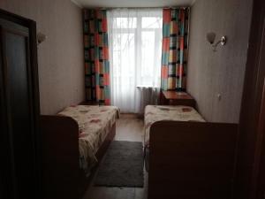 Postel nebo postele na pokoji v ubytování ГОТЕЛЬ Заводу 410 ЦА