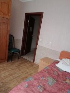 Postel nebo postele na pokoji v ubytování ГОТЕЛЬ Заводу 410 ЦА