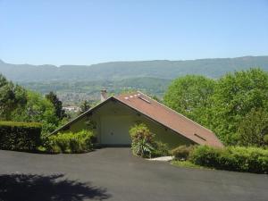 a garage with a roof on top of it at L'ermitage in Chambéry