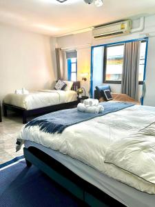 Ένα ή περισσότερα κρεβάτια σε δωμάτιο στο Comfort Home Patong