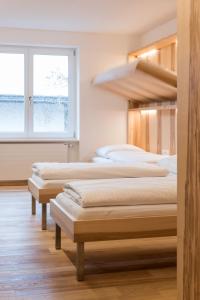 Letto o letti in una camera di Bildungshaus Arbogast