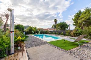 Bazén v ubytování Bas de Villa Piscine 150m de la mer nebo v jeho okolí