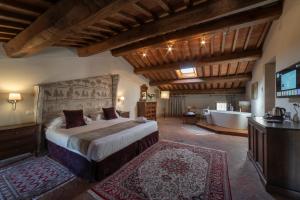 Postel nebo postele na pokoji v ubytování Palazzo Leopoldo Dimora Storica & Spa