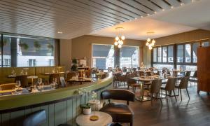 A restaurant or other place to eat at The Morrison Dublin, Curio Collection by Hilton