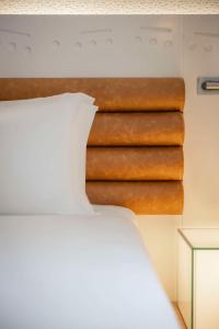 A bed or beds in a room at The Morrison Dublin, Curio Collection by Hilton