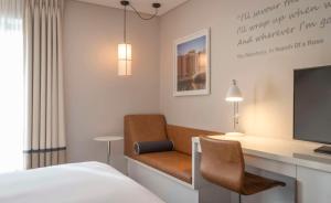 A television and/or entertainment centre at The Morrison Dublin, Curio Collection by Hilton
