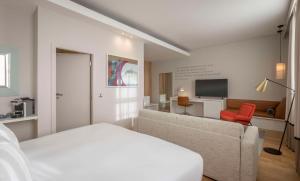 A bed or beds in a room at The Morrison Dublin, Curio Collection by Hilton