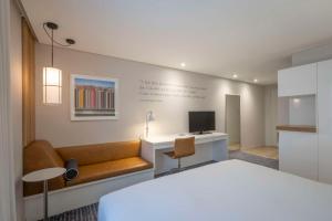A bed or beds in a room at The Morrison Dublin, Curio Collection by Hilton