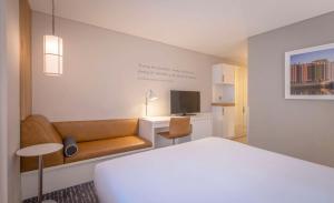 A bed or beds in a room at The Morrison Dublin, Curio Collection by Hilton