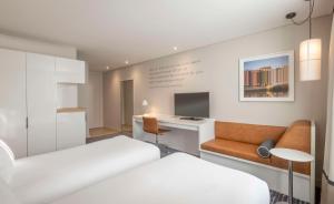A bed or beds in a room at The Morrison Dublin, Curio Collection by Hilton