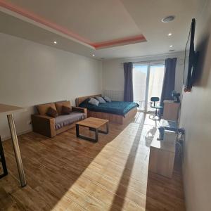 Posedenie v ubytovaní Apartament Tęczowy + 13 fotografií
