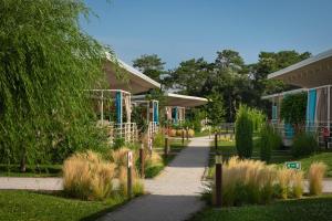 Сад в Lino delle Fate Eco Resort