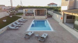 Πισίνα στο ή κοντά στο Avelia Luxury Villa with private pool +57 φωτογραφίες