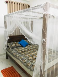 Postel nebo postele na pokoji v ubytování Midigama Villa Resort