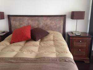 מיטה או מיטות בחדר ב-Quintaluna
