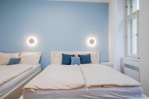 Posteľ alebo postele v izbe v ubytovaní Seifertova Apartments by Willstay