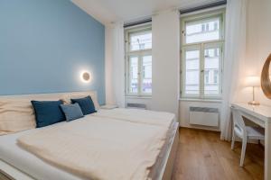 Posteľ alebo postele v izbe v ubytovaní Seifertova Apartments by Willstay