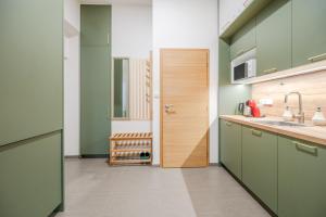 Kuchyňa alebo kuchynka v ubytovaní Seifertova Apartments by Willstay