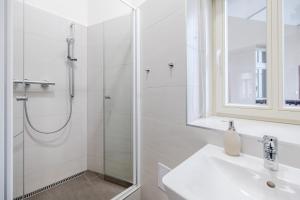 Kúpeľňa v ubytovaní Seifertova Apartments by Willstay