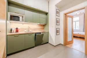 Kuchyňa alebo kuchynka v ubytovaní Seifertova Apartments by Willstay