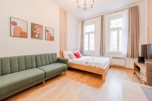 Televízia a/alebo spoločenská miestnosť v ubytovaní Seifertova Apartments by Willstay