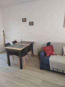Posezení v ubytování Gîte indépendant de plein pied près de Colmar
