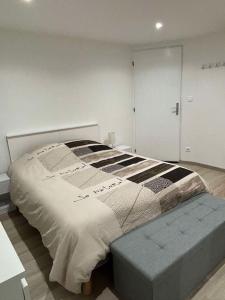 Postel nebo postele na pokoji v ubytování Gîte indépendant de plein pied près de Colmar