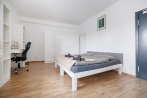 Postel nebo postele na pokoji v ubytování Central Urban Studio
