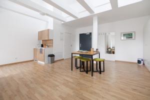 Kuchyň nebo kuchyňský kout v ubytování Central Urban Studio