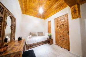 Voodi või voodid majutusasutuse Riad Nadalinn toas