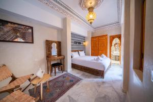 Voodi või voodid majutusasutuse Riad Nadalinn toas