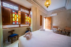 Voodi või voodid majutusasutuse Riad Nadalinn toas