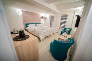 Postel nebo postele na pokoji v ubytování Apartmani Aleksandra u centru grada