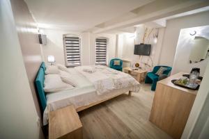 Postel nebo postele na pokoji v ubytování Apartmani Aleksandra u centru grada
