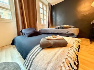 Postel nebo postele na pokoji v ubytování Appartement 3 prsn Au pied de la Citadelle