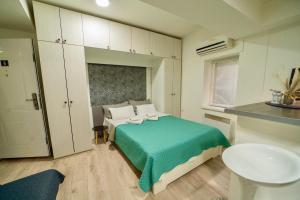 Postel nebo postele na pokoji v ubytování Apartmani Aleksandra u centru grada
