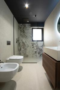 Koupelna v ubytování Villa Della Lupa Luxury Rooms + 30 fotografií
