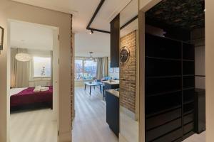 Voodi või voodid majutusasutuse Golden Hour Apartments- Grunwaldzka 42 toas