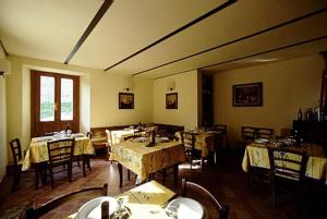 Reštaurácia alebo iné gastronomické zariadenie v ubytovaní B&B Borgo Valagnesi casa Annarita