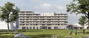 a large white building with people standing in front of it at Montana Dijon in Dijon