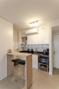 Una cocina o cocineta en Modern 1 Bed Apt In Las Mercedes