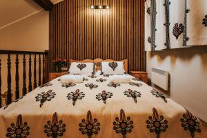 Posteľ alebo postele v izbe v ubytovaní VisitZakopane Apartament Limba