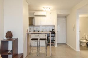 Una cocina o cocineta en Modern 1 Bed Apt In Las Mercedes