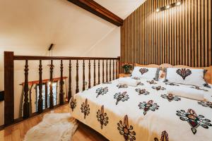 Posteľ alebo postele v izbe v ubytovaní VisitZakopane Apartament Limba