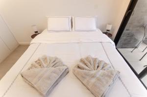 Una cama o camas en una habitación de Modern 1 Bed Apt In Las Mercedes 16 fotos más