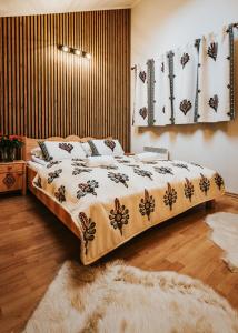 Posteľ alebo postele v izbe v ubytovaní VisitZakopane Apartament Limba