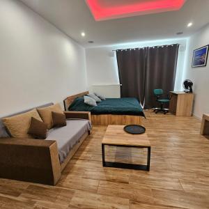 Posedenie v ubytovaní Apartament Tęczowy