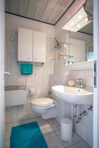 Ένα μπάνιο στο Ferienwohnung Tohuus an der Nordsee
